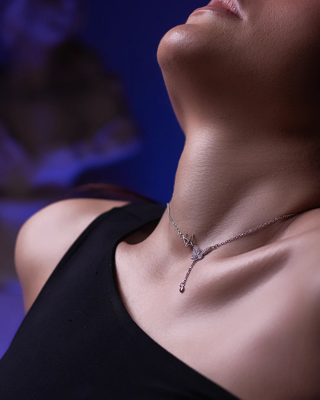 Winged Whisper Silver Necklace