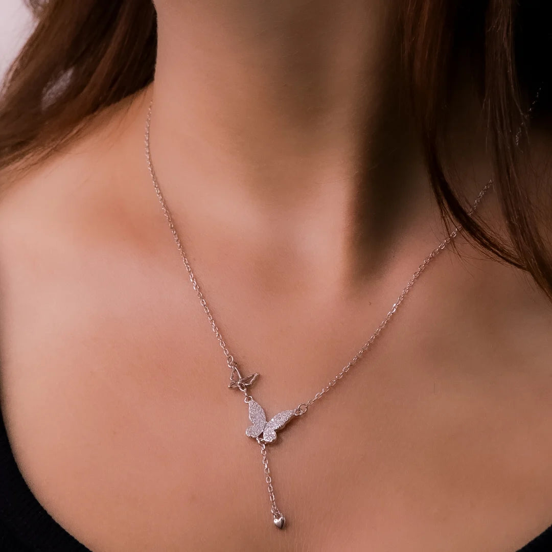 Winged Whisper Silver Necklace