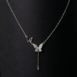 Winged Whisper Silver Necklace